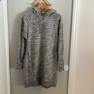 Grey hoodie sweatshirt dress by Dalia. Zipper pockets and thumb holes